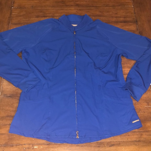 Lauderdale scrub jacket size large blue in color